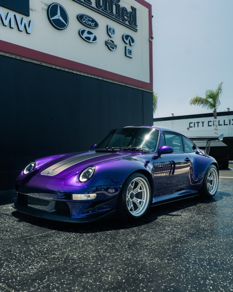 GW Porsche front three-quarter near dealership signage