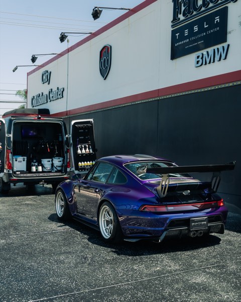 GW Porsche rear three-quarter beside the Wrap City Detailing van